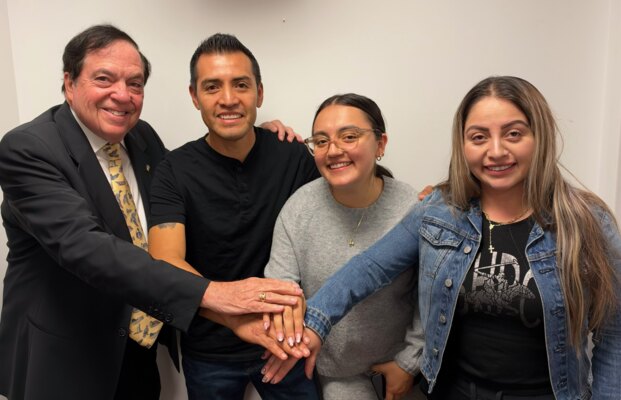 Attorney Stephen M. Komie with the owners of Yanqui Leon, LLC